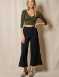 70s Allure: High-Waist Flares with Cozy Wrap